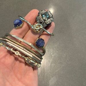 Stash of Kendra Scott bangles cuff and statement ring